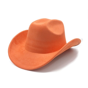 Detail view of the orange suede texture and wide brim of this vintage western cowboy hat