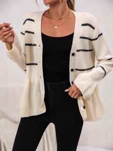 Women's cream knit cardigan with black stripes, button-down front and ruffled hem detail