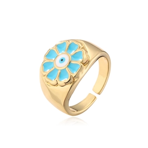 Close-up of gold flower ring with light blue enamel and adjustable open band design