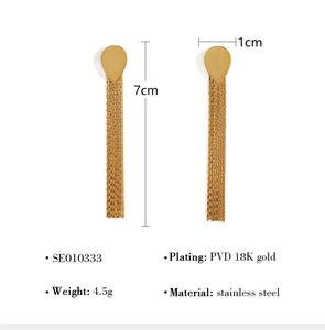 Detail showing 7cm length and 1cm width dimensions of 18K gold plated tassel earrings
