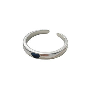 Adjustable silver ring for couples with a glowing dark blue heart center piece