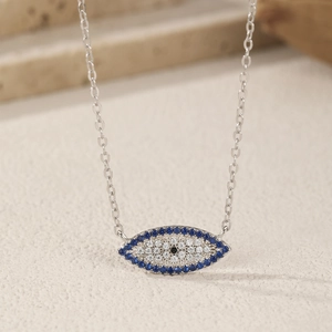 Elegant S925 sterling silver evil eye necklace with blue and white shimmering crystals
