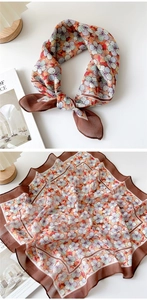 Detail of floral linen-cotton square scarf with dark brown borders and soft blue patterns