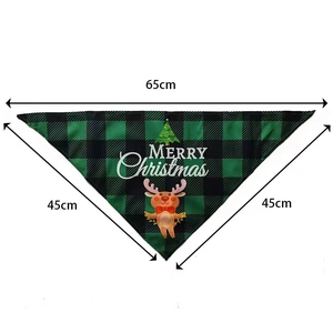 Detailed view of green plaid Christmas pet bandana with Merry Christmas print 65x45cm