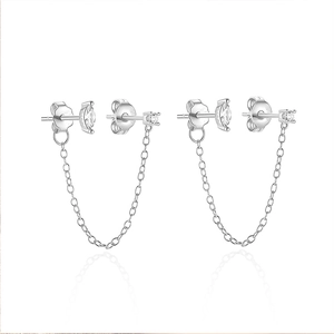 Detail shot of S925 sterling silver chain stud earrings with marquise-shaped gemstones