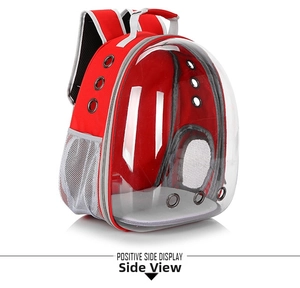 Detail view of red pet capsule backpack showing metal ventilation holes and side mesh pocket