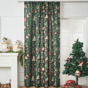 Detail of Christmas themed dark green curtains with festive holiday prints and texture