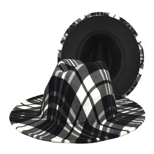 Classic black and white plaid fedora hat with wide brim in a British vintage style