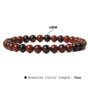 Detail view of 6mm natural carnelian agate bead bracelet with 19cm elastic circumference