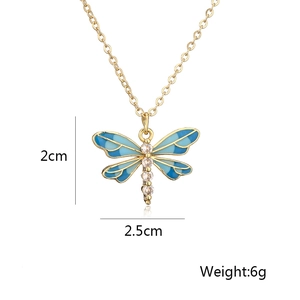 Detail view of 18K gold-plated dragonfly necklace with blue enamel dimensions and weight