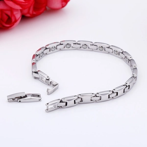 Detail of silver titanium steel magnetic bracelet with germanium stones and clasp
