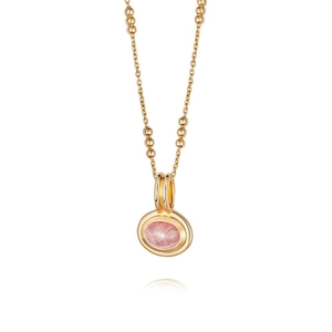 Detailed close-up of a layered gold necklace with elegant pink gemstone oval pendant