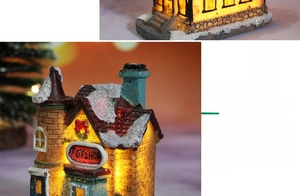 Close-up of LED glowing resin Christmas toy shop figurine with realistic snow detail