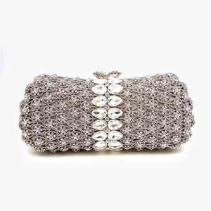 Macro detail of the silver rhinestone evening clutch bag with sparkling crystal stones
