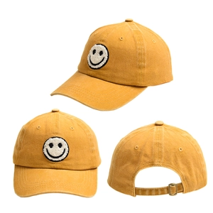 Detailed views of yellow cotton baseball cap with smiley face embroidery and metal buckle