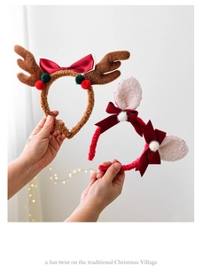 Detailed close-up of plush Christmas reindeer antlers and bunny ear headbands