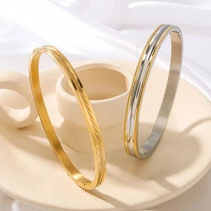 Bracciali rigidi in acciaio inossidabile con texture irregolare in oro e argento