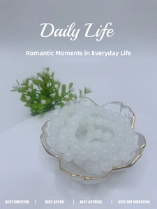 8mm white glass beads in a glass petal bowl for DIY jewelry and bracelet making