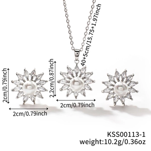 Detail view of sunflower jewelry set with cubic zirconia petals and pearls, size specs included