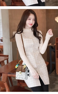 Detail of a mini rabbit-themed handbag styled with a beige tweed vest dress outfit