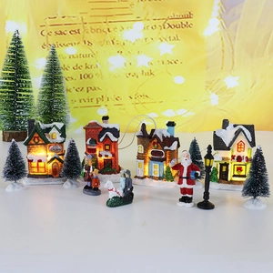 Luminous Christmas village set with miniature houses, Santa, and trees for festive decor
