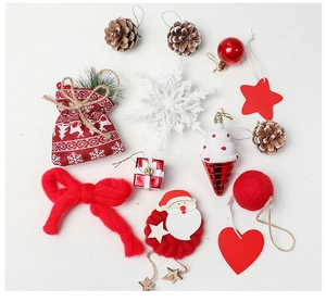 Detailed flat lay of Christmas wood tree ornaments with pine cones and festive star pendants