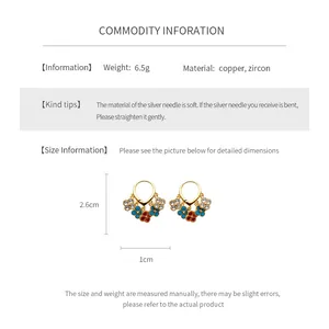 Detail view of gold-plated flower tassel earrings with zircon inlay and dimensions