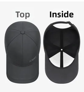 Vue détaillée du dessus et de l'intérieur d'une casquette gris foncé avec broderie