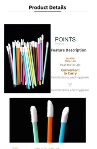 Macro shot of disposable lip brushes with colorful hollow handles and soft white flocked tips