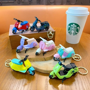Vibrant alloy pull-back miniature scooter keychain set with cute character prints