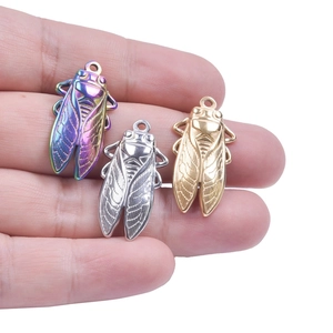 Three-color metal cicada pendant set in gold, silver, and iridescent rainbow plating