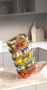 Stackable 5-piece food containers with grey lids for organized fridge storage