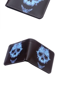 Detail of bifold wallet featuring blue skull prints and contrast white stitching