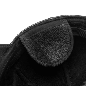 Close-up of adjustable elastic band and interior lining on a men's black PU leather cap