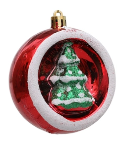 Detail of red plating ornament with green glitter Christmas tree and white frosted frame