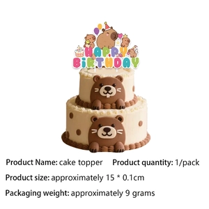 Close-up of Capybara cake topper set with Happy Birthday lettering for party decoration