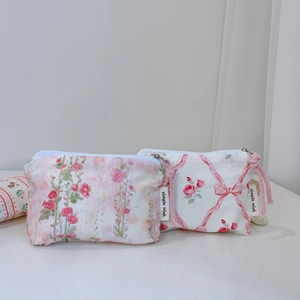 Floral cotton coin purses with pink zipper pulls and simple wish label detail