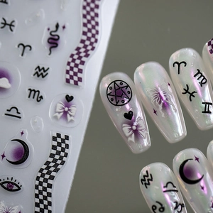 Purple constellation nail stickers with zodiac signs and butterflies on glossy false nails