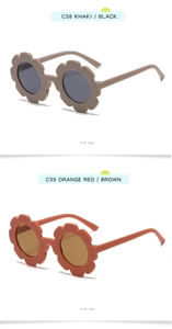 Close-up of children flower sunglasses in khaki C38 and orange red C39 matte finishes
