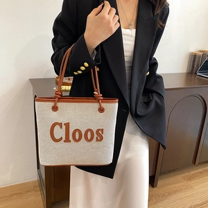 Fashionable canvas tote bag with brown PU leather trim and shoulder strap for women
