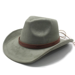 Detail of grey-green suede cowboy hat featuring an ethnic embossed band and leather ties