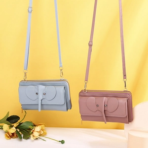 Cute elephant crossbody phone purse in blue and pink with double zipper and adjustable strap