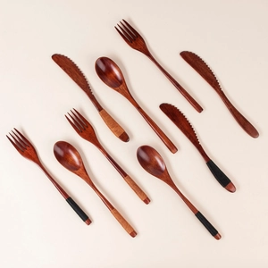 Detailed view of 9-piece wooden cutlery set with black and brown twine-wrapped handles