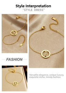 Detailed macro view of gold-plated bracelet with three sliding crystals in a round pendant
