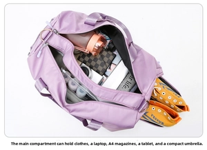 Top view of spacious purple travel bag interior organized with laptop, gear and clothing