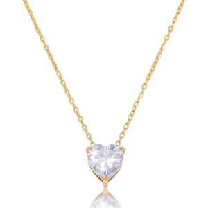 Macro detail of heart-shaped emerald zircon pendant necklace with gold plated chain