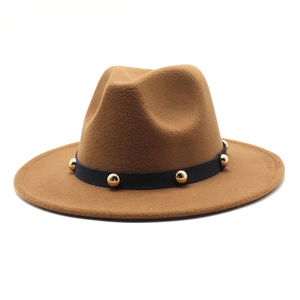 Close-up of brown wool fedora with black belt and golden metal rivets decoration
