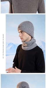 Close-up of grey ribbed knit beanie and neck warmer set with soft thermal texture