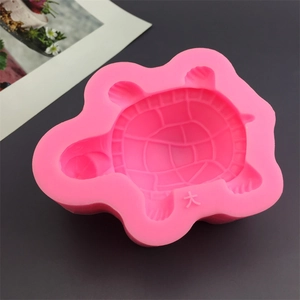 Detailed macro view of a pink turtle-shaped silicone mold for cake and DIY crafts