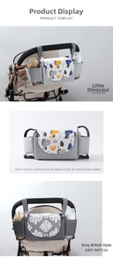 Detail of baby stroller organizer showing cartoon dinosaur print and water-resistant fabric